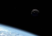 Una miniluna acompañará a la Tierra durante las próximas décadas Ilustración de un objeto cercano a la Tierra, como el asteroide o miniluna 2022 NX1. / NASA/JPL-Caltech